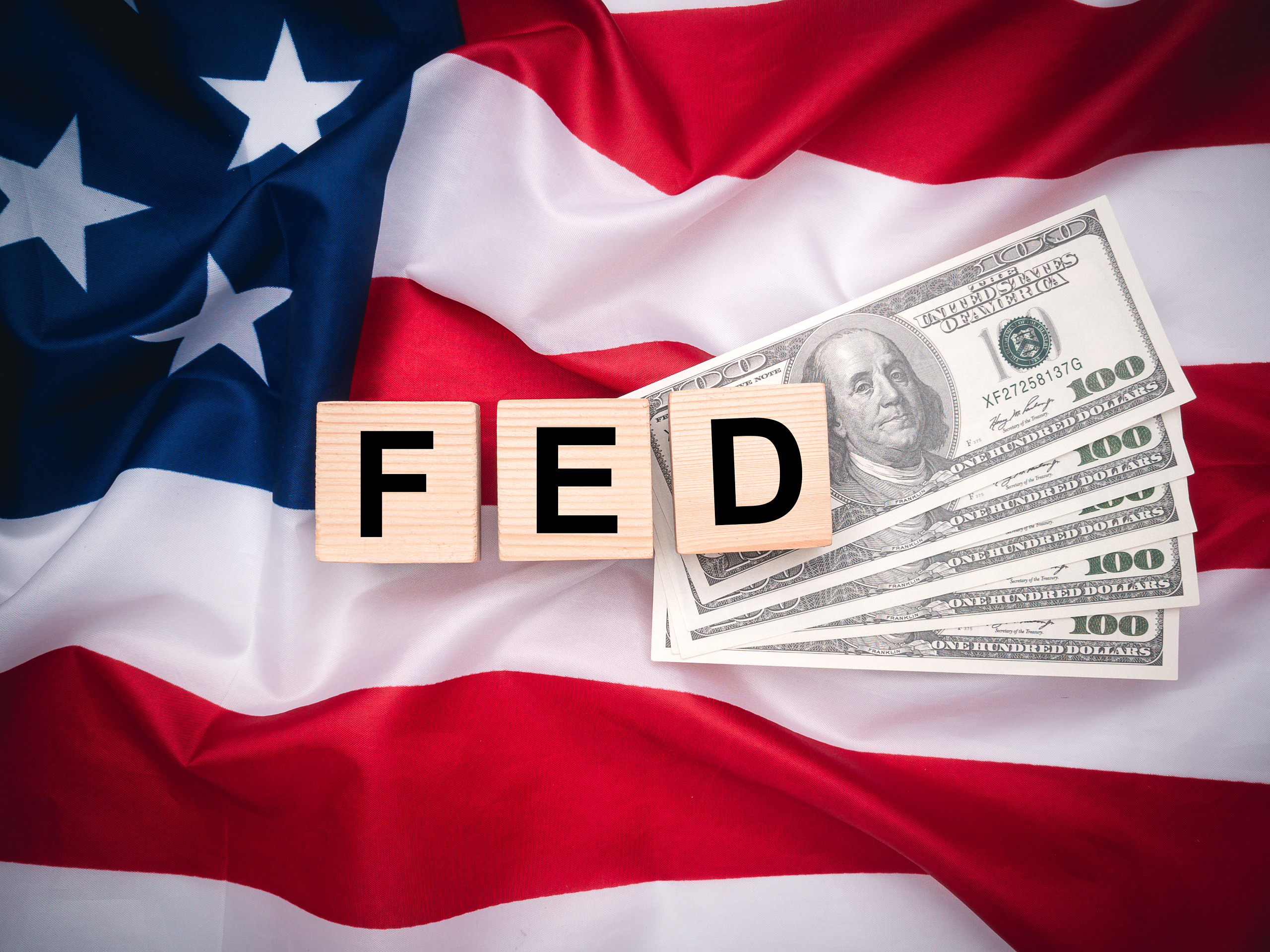 Fed Signals Cautious Optimism with 2024 Rate Cut Plan